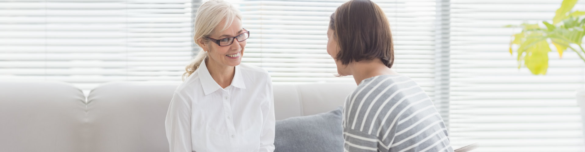 woman talking to her counselor