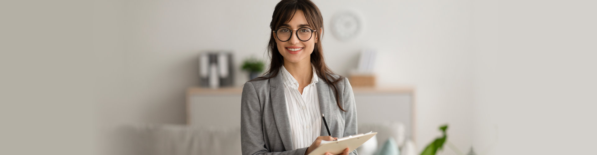 young female psychiatric holding her notes